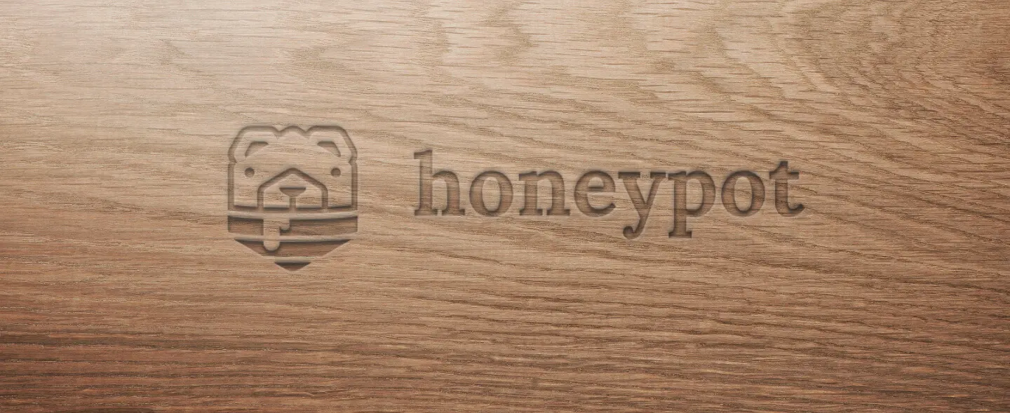 honeypot loog on wood surface